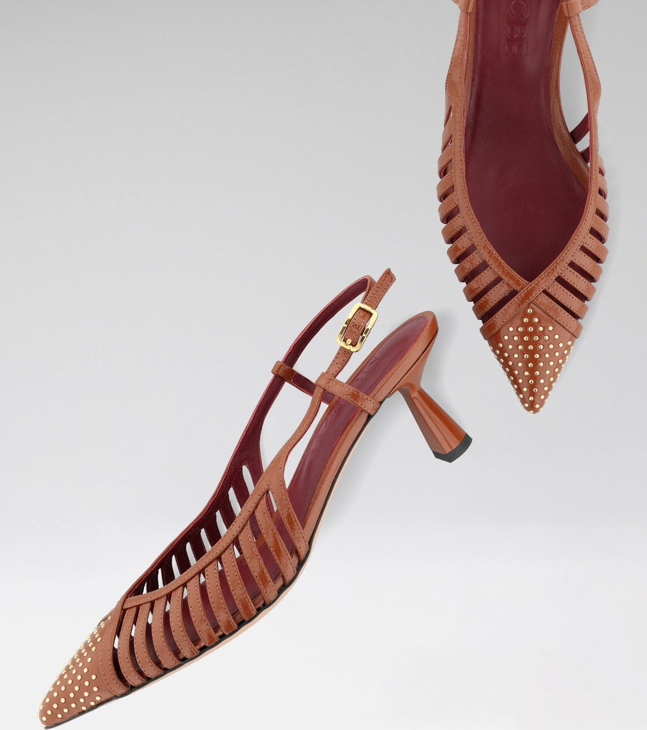 DREAM leather slingback with a studded pointed toe and 60 mm heel.
