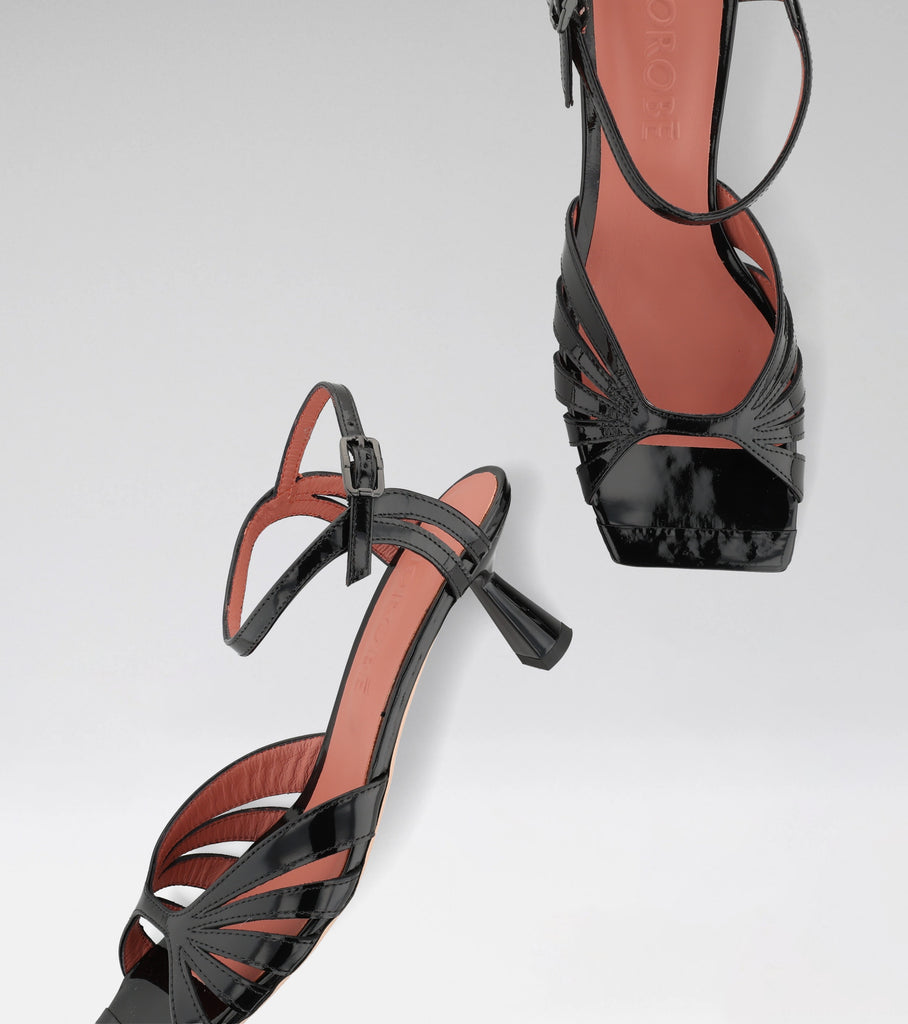 GIOIA black leather sandal with curved straps, squared toe and 60 mm heel.