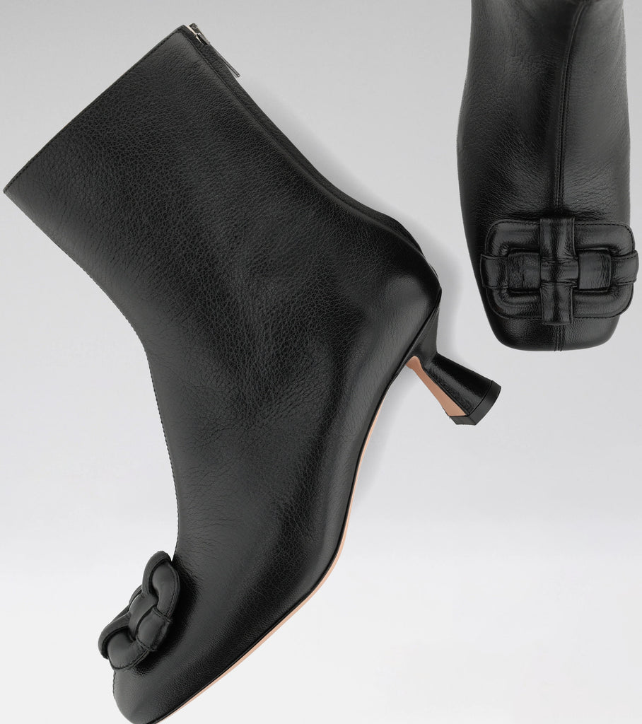 LIV black leather boot with squared toe, morobé brooch and 55 mm heel.
