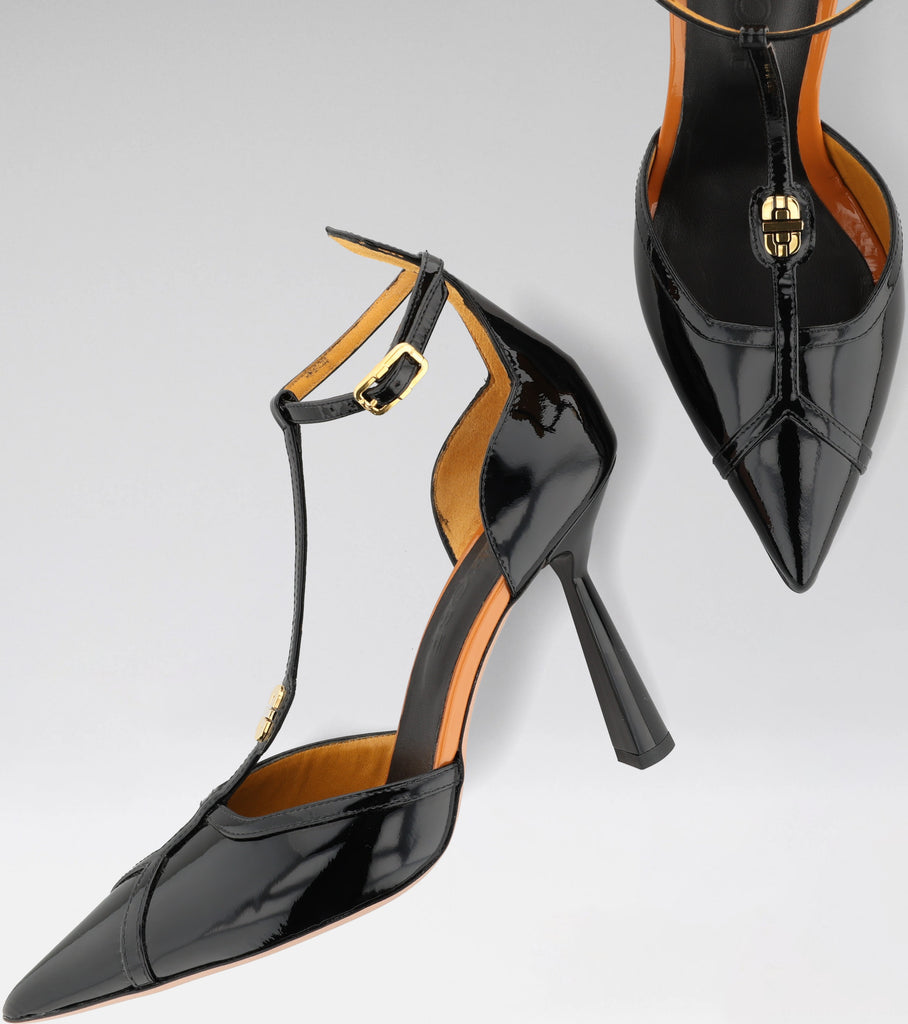 MADISON black pump with T-bar strap, MOROBÉ brooch and 100 mm heel.