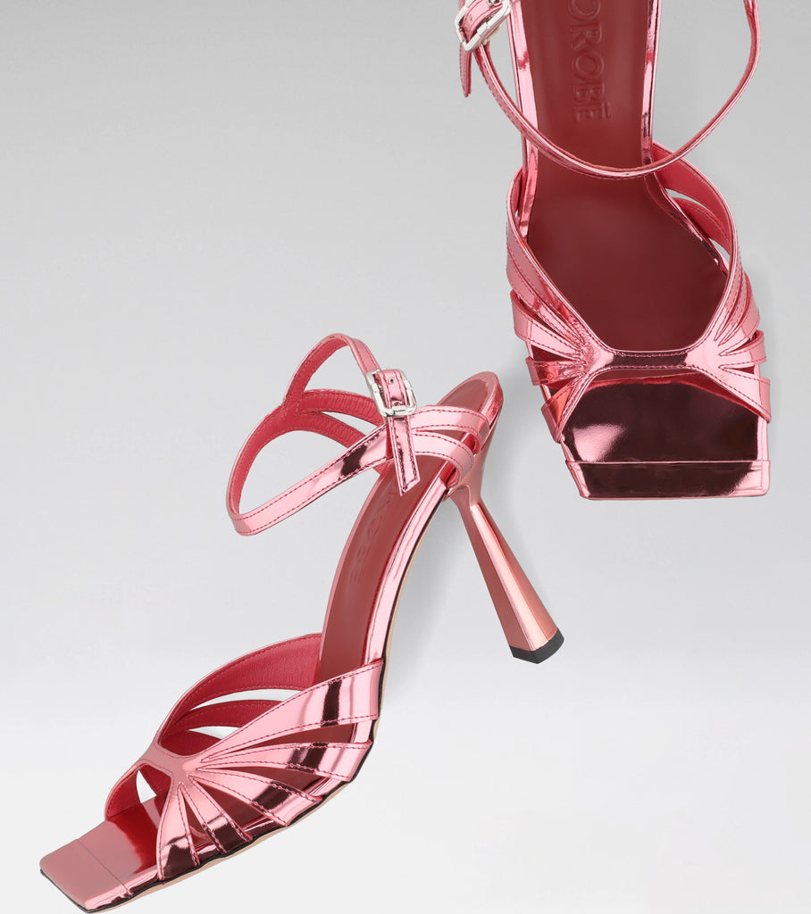 MILLIE pink sandal with curved straps, squared toe and 100 mm heel.
